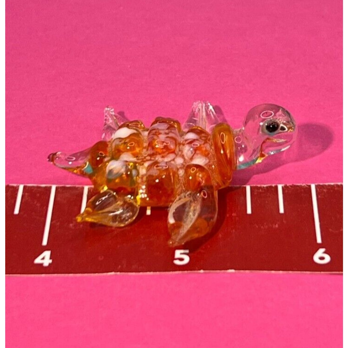 Glass Turtle Orange and White Small Chip at end of Flipper (See photos)
