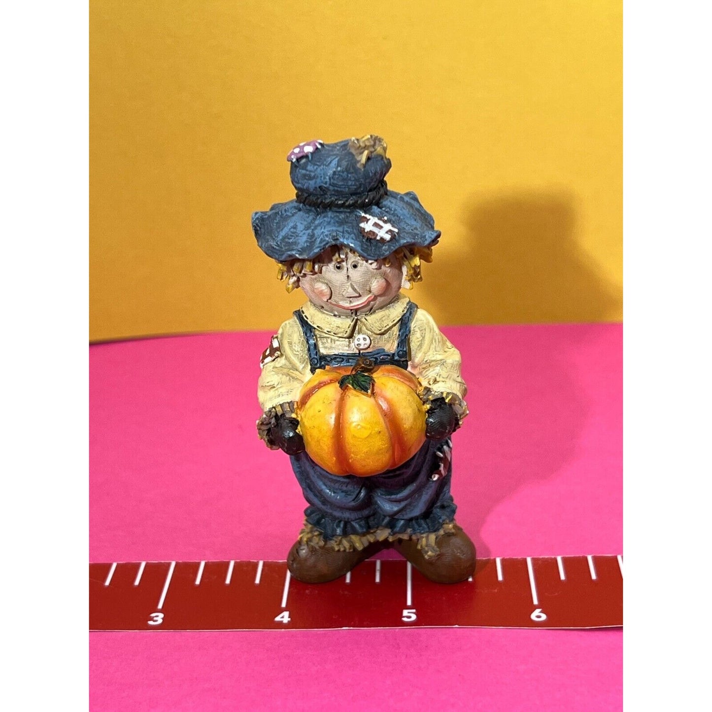 Scarecrow Holding Pumpkin Young's China figurine