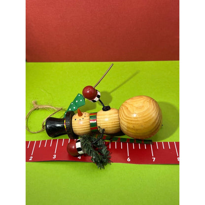 Wooden Snowman Holding Christmas Tree Ornament 5"