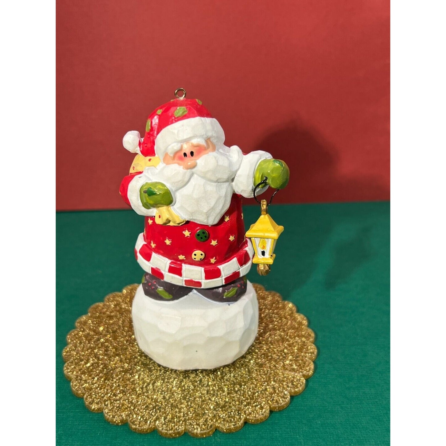 Santa holding a swinging lantern Christmas Decoration