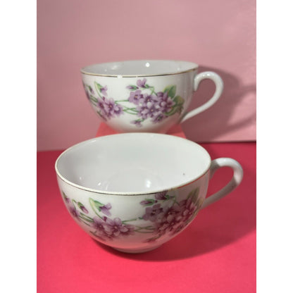 Purple Flower 2 piece matching Tea Cups Occupied Japan sm chip on one see Photos